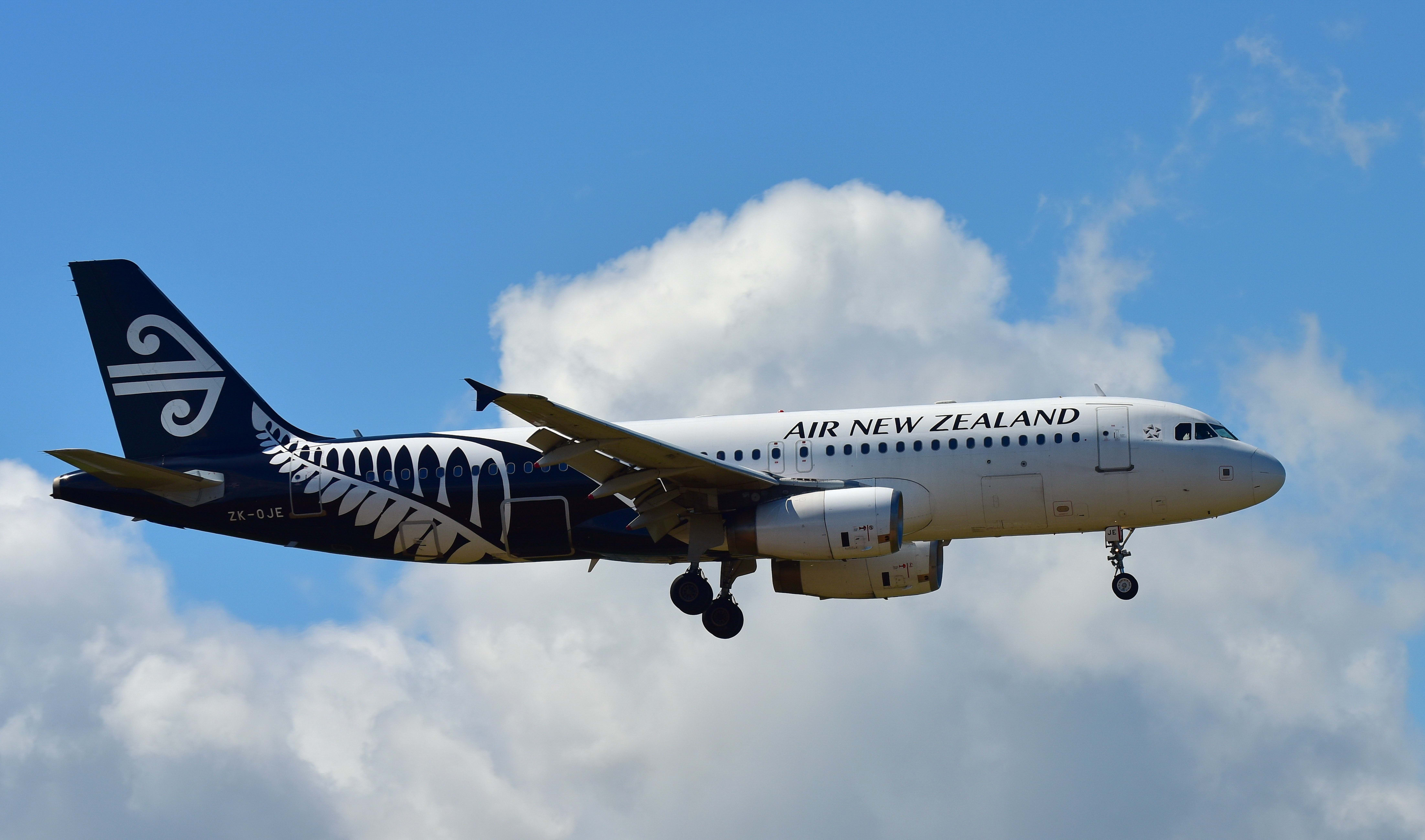Air New Zealand Airbus A320 landing at Auckland International Airport.