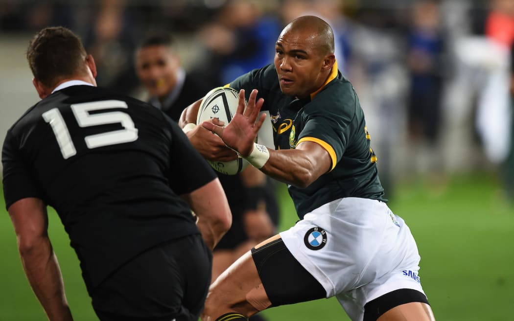 South Africa's Cornal Hendricks heads to the try line against the All Blacks in Wellington, 2014
