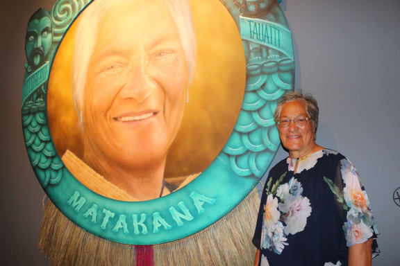 Kathy Hoete with her portrait painted by her son Graham.