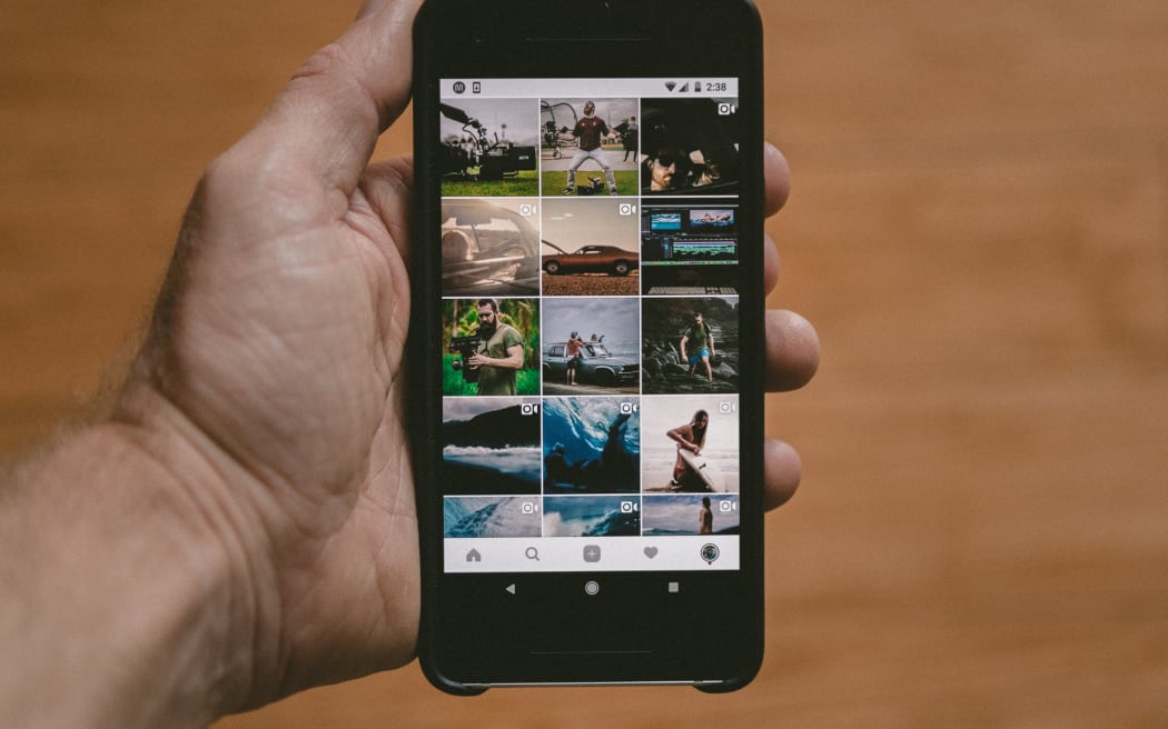 social media on smartphone. Android. holding smartphone.