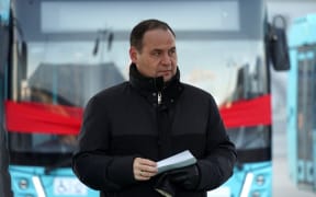 8153092 29.03.2022 Belarusian Prime Minister Roman Golovchenko speaks during the ceremony of the solemn transfer of Belarusian-made buses to St. Petersburg, as well as the presentation of new models of MAZ buses, electric buses and utility vehicles. Alexei Danichev / Sputnik (Photo by Alexei Danichev / Sputnik / Sputnik via AFP)