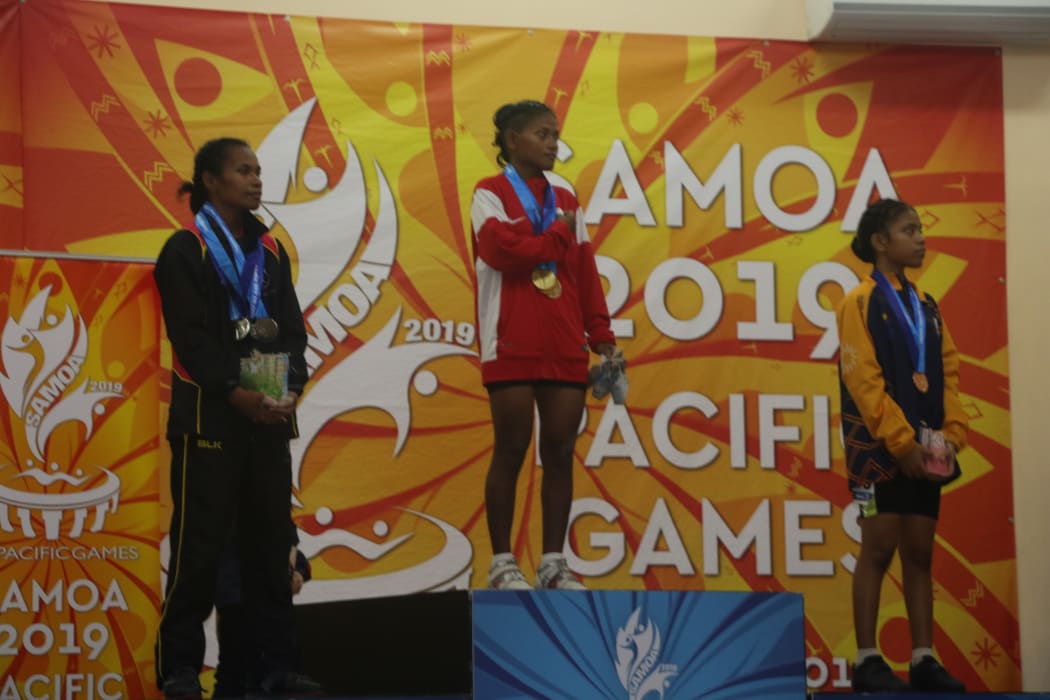 Kiribati's Tebora Willy won three gold medals in the women's 45kg division.