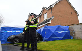 Police officers outside the home of Peter Murrell, former chief executive of the Scottish National Party (SNP), and his wife, Scotland's former First Minister and former leader of the SNP, Nicola Sturgeon, in Glasgow on April 5, 2023.
