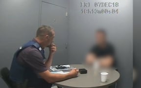 Millane trial: blurred screengrab of police interview with accused.