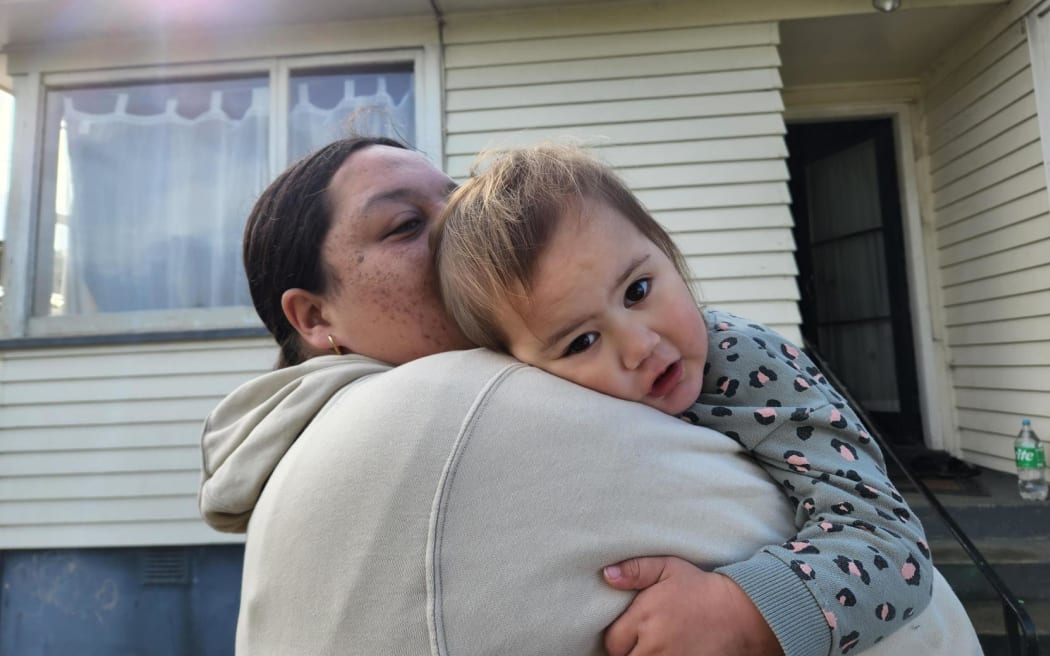 Two-year-old West Auckland toddler Willow is cuddled by her mum, Waimirirangi Rudolph. Willow was reunited with her family on Sunday night after going missing from her home on Zodiac Street in Henderson earlier in the afternoon. She was found by a member of the public wandering on Universal Drive and her disappearance sparked a massive search, involving hundreds of locals.