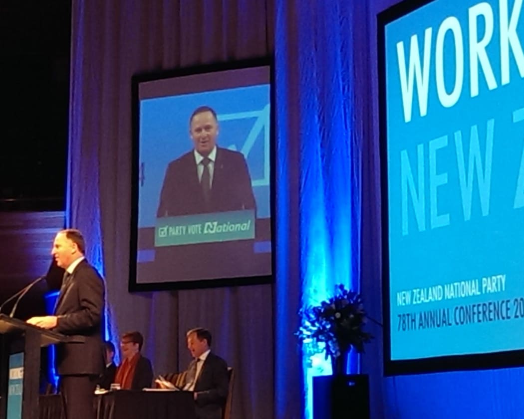John Key giving his opening address to the conference.
