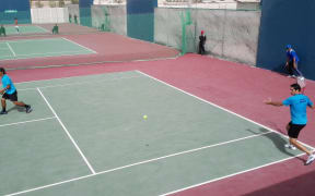 Doubles pairing Brett Baudinet from the Cook Islands and Guam's Daniel Llarenas competing in the Davis Cup tie in Bahrain.