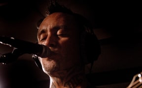 Tiki Taane performing in the Auckland studio for NZ Live