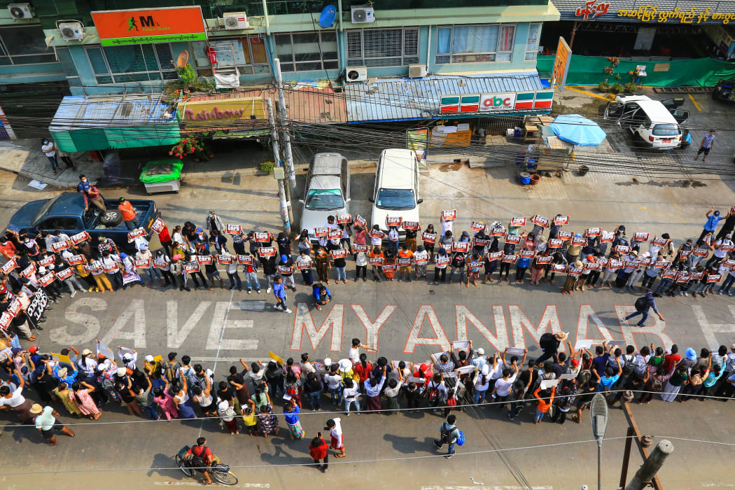 Protesters taking part in a demonstration against the military coup in Yangon's Hlaing township.