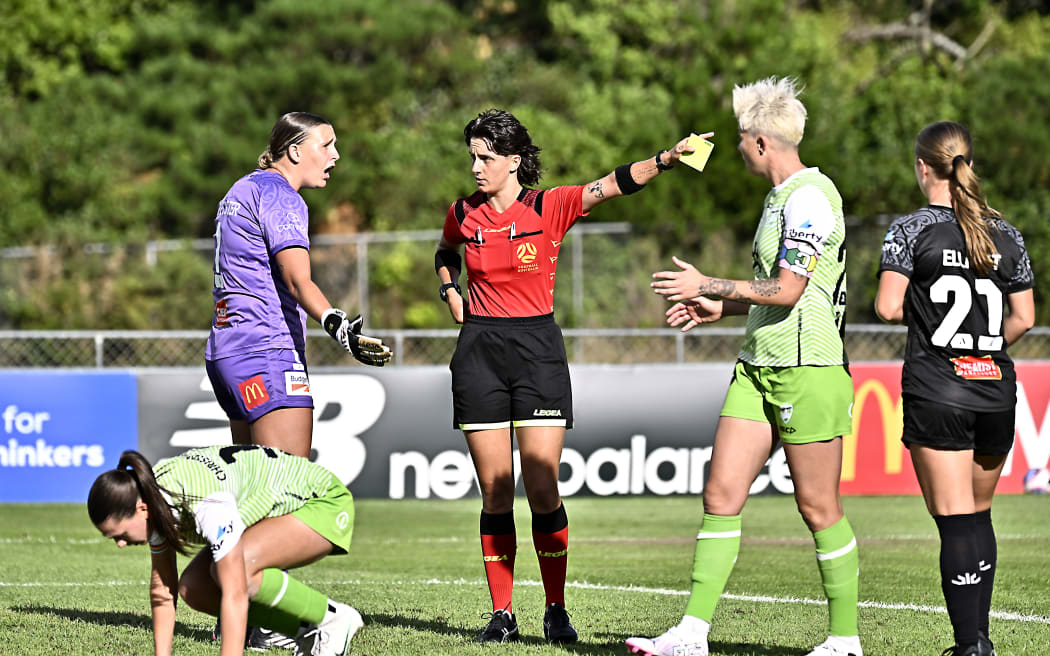 Referee Molly Godsell shows a red card to Rylee Foster (GK) of the Phoenix during the A-League Women round 14 match between Wellington Phoenix and Canberra United.