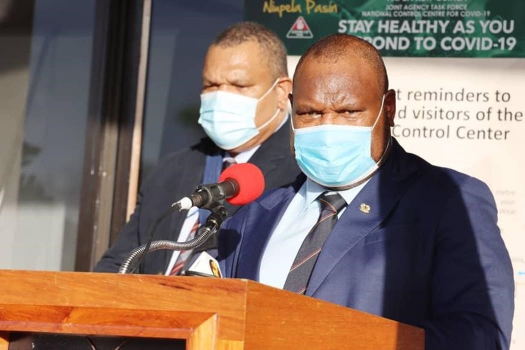 Papua New Guinea's Prime Minister James Marape (right) with the Controller of the National Pandemic Response, Police Commissioner David Manning.