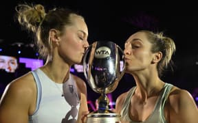 Erin Routliffe (L) and Gabriela Dabrowski (R) after winning the women's doubles final at the WTA Finals in Riyadh.