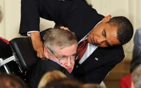 In this file photo taken on August 12, 2009, Stephen Hawking receives the Presidential Medal of Freedom from US President Barack Obama.