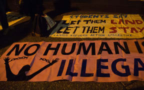 A protest banner at a rally at Sydney Town Hall in June over the case of the baby facing return to Nauru.