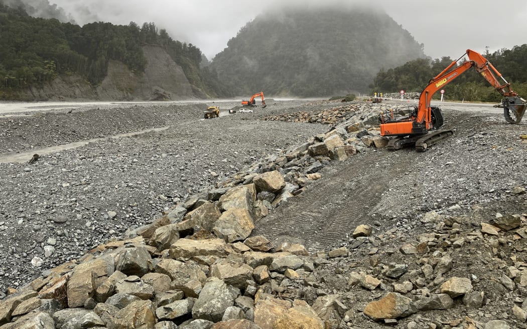 Initial rock 'rip rap' work underway just above the Waiho (Waiau) River Bridge on the southern side of Franz Josef township, in June this year. The work was initial work linked to the stage one Waiho protection scheme being funded through 'shovel ready' funds.