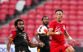 Action from the Singapore-Papua New Guinea game on Friday