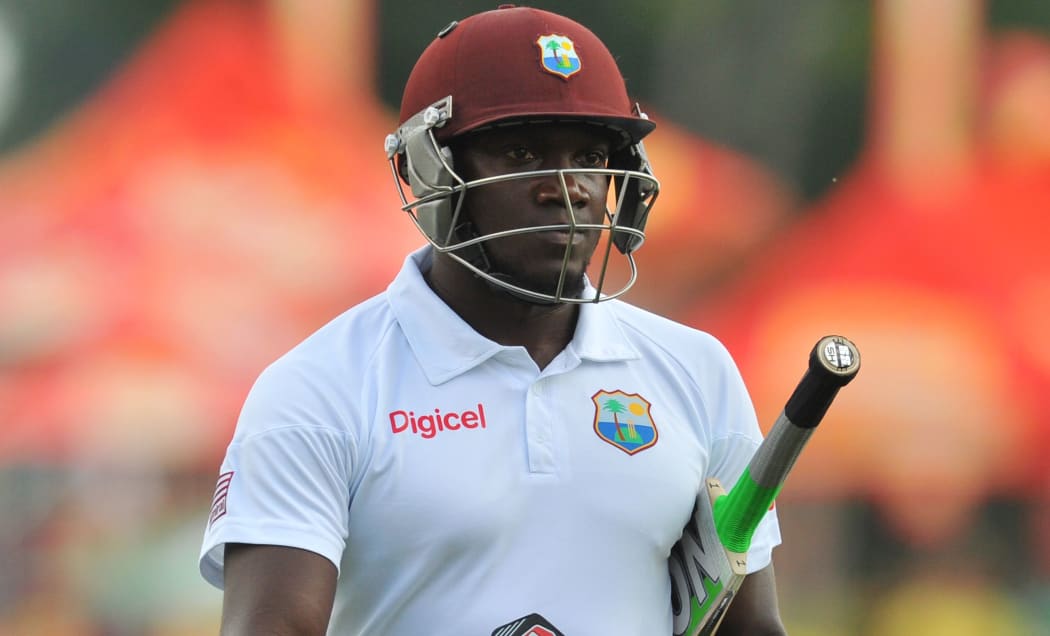 West Indies cricketer Denesh Ramdin trudges off the pitch.