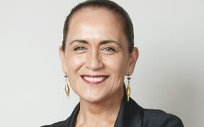 Traci Houpapa.