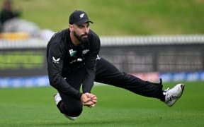 Black Cap Daryl Mitchell takes a catch.