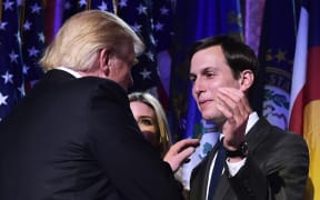 This file photo taken on November 9, 2016 shows President-elect Donald Trump with son-in-law Jared Kushner (R) during an election night party at a hotel in New York.