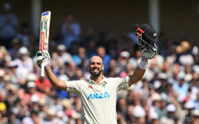 Daryl Mitchell of New Zealand celebrates a century during day 2 of the 2nd Test between the New Zealand Black Caps and England at Trent Bridge Cricket Ground, Nottingham, England on Saturday 11 June 2022.