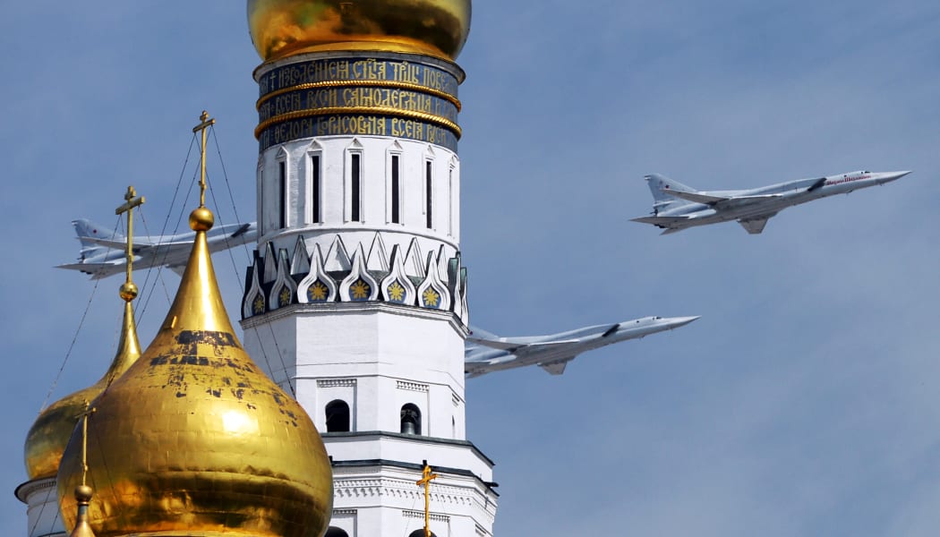Tupolev Tu-22M3 Backfire strategic bombers fly over Red Square.