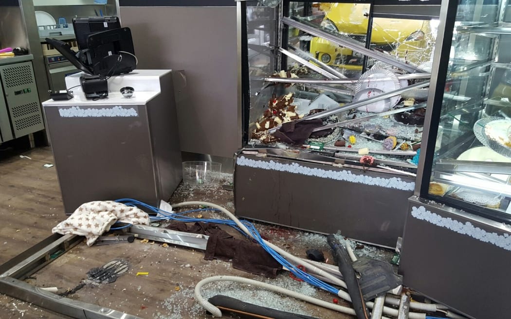 The cake cabinet inside the store was crushed in the crash.