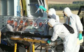 Roman Catholic priest Miguel Pajares was transported from Liberia to a Madrid hospital.