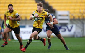 Hurricanes Jordie Barrett runs the ball during the Hurricanes vs Highlanders Super Rugby Aotearoa match at Sky Stadium on Sunday the 12th of July 2020. Photo by Marty Melville / Photosport.co.nz