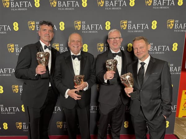 From left: Eric Saindon, Joe Letteri, Dan Barrett and Richie Baneham of Wētā FX with their Bafta award for their work on Avatar: Fire and Ash.