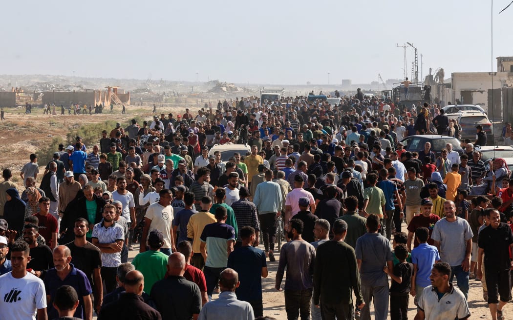 Palestinians gather near an aid distribution site run by the US-backed Gaza Humanitarian Foundation in Rafah, Gaza, on May 27.
