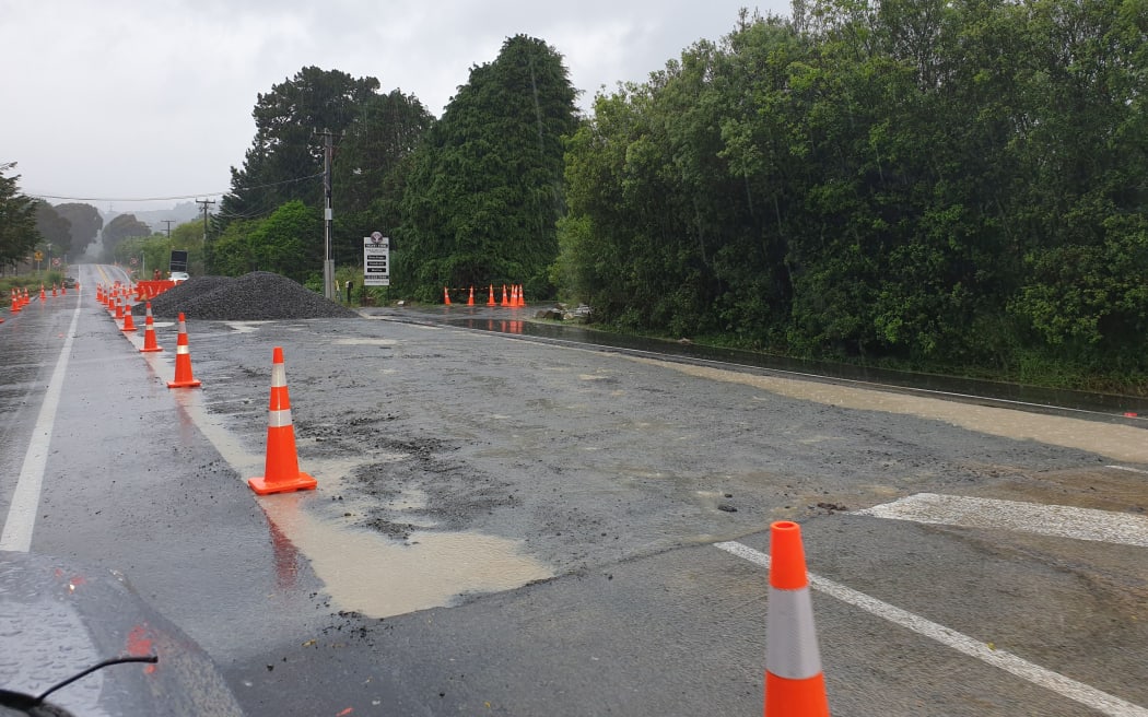Repairs underway at State Highway SH58 where the tarmac had cracked and lifted