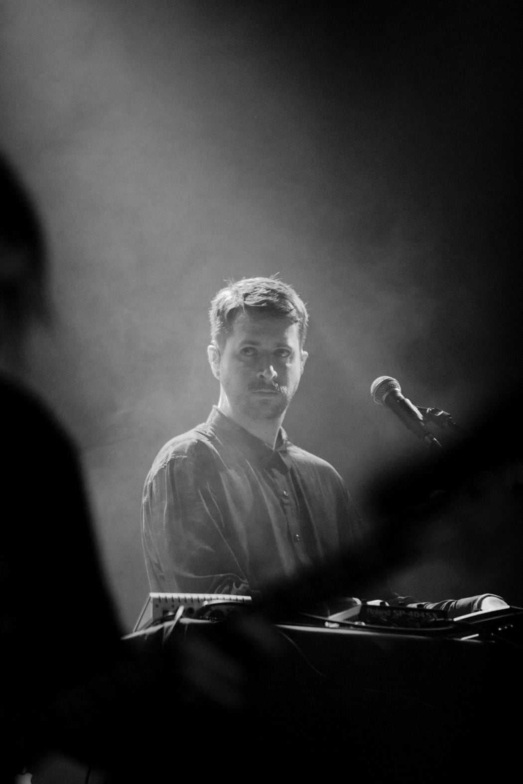Josh Fountain onstage with Leisure at Auckland's Powerstation