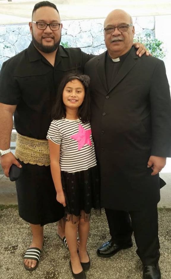 Attending a church service in Tonga with my father and daughter
