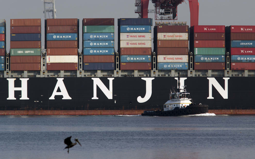 A Hanjin container ship docks at Long Beach, California, after a week stranded at sea for fear it could be seized by creditors.