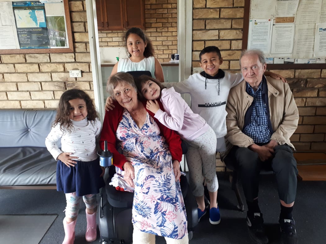 Gil and Sue Layt with their grandkids