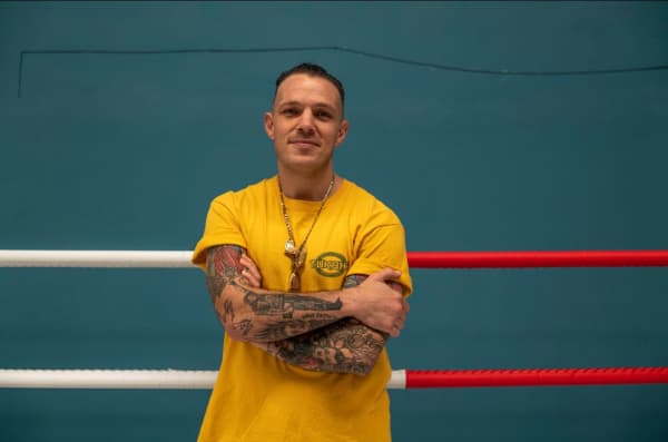 Richie Hardcore, a Muay Thai champion turned social advocate in the masculinity space.