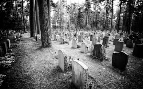 Old graveyard in black and white with film noir feeling.