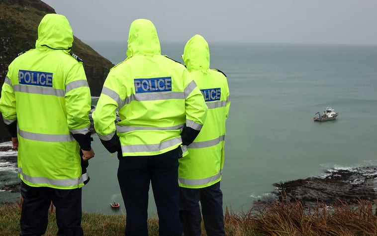 A police team at a remote cove in Southland are now considering using a helicopter to lift a vehicle linked to a missing 11-year-old out of the sea.