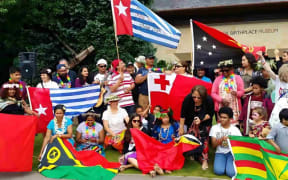 Members of the Pacific Islands Festival in Europe show their support for the Free West Papua campaign.