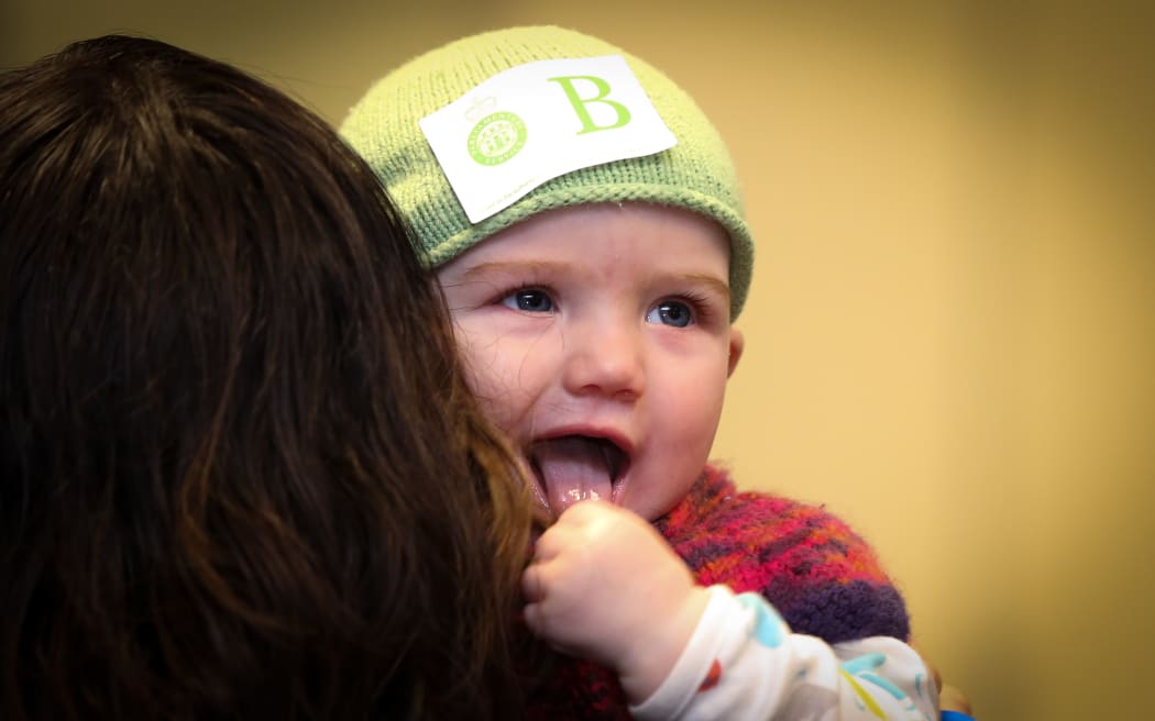 Hazel Kehoe Rowden, aged 7 months, came to support the new paid parent bill.