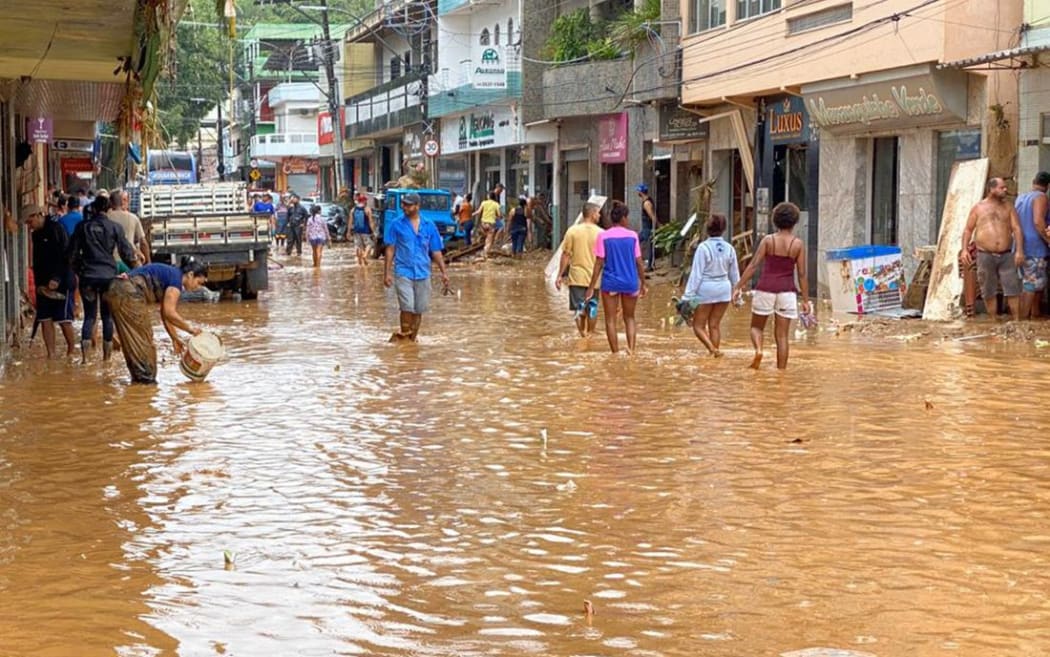 Handout picture by Espirito Santo State Government showing a flooded street after heavy rain and floods, at the city of Iconha, state of Espirito Santo, Brazil.
