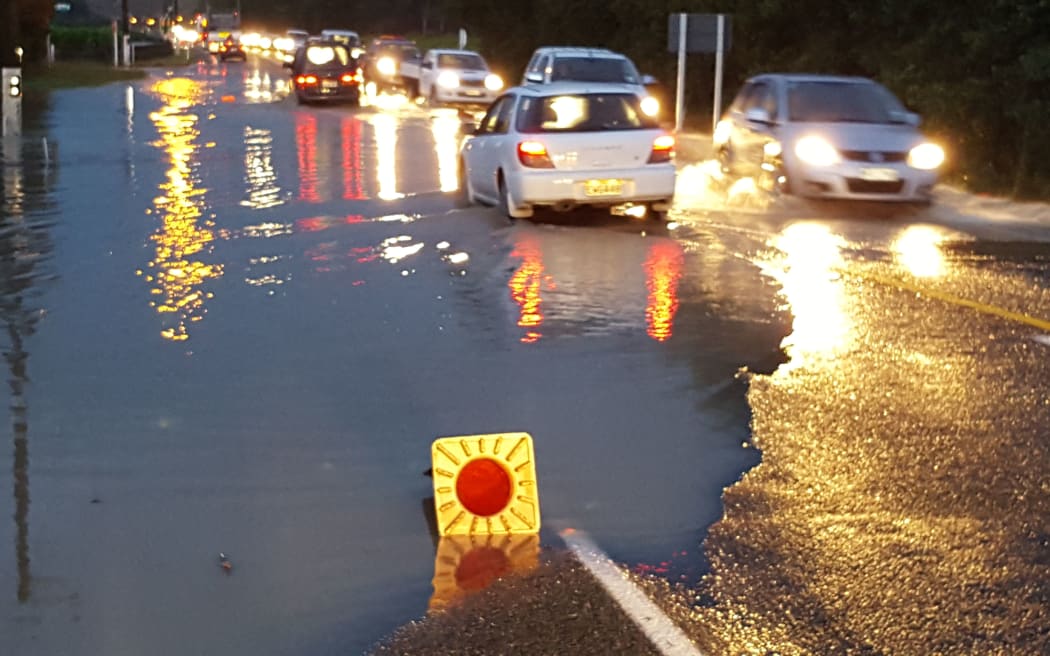 Floodwaters on the approach to Brightwater Bridge in the Nelson region.