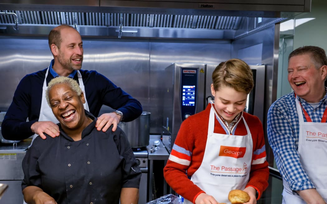Prince William and his son George at The Passage, London
