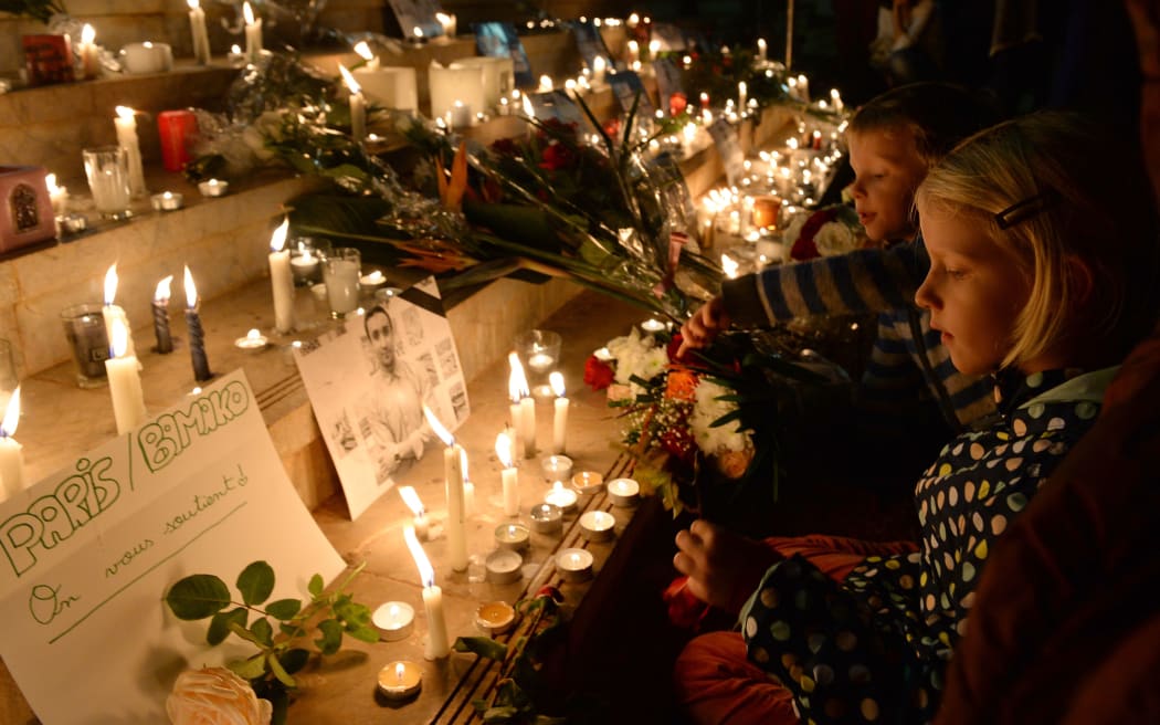 People gather for a candlelight vigil in Rabat, Morocco, in solidarity with victims of the attacks in Paris.