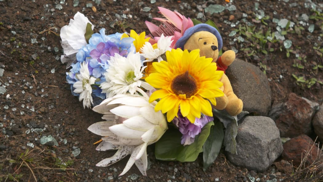Flowers mark the spot where Hannah Francis died after a Ruapehu Alpine Lifts bus crashed while descending the mountain.
