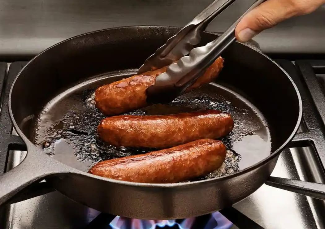 vegan sausages in a pan