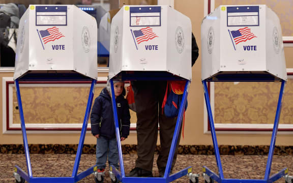 Americans have started voting in critical midterm elections that mark the first major voter test of Donald Trump's presidency, with control of Congress at stake.