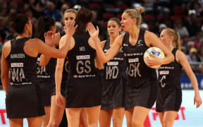Casey Kopua leads the Silver Ferns from the court after their upset win over Australia.