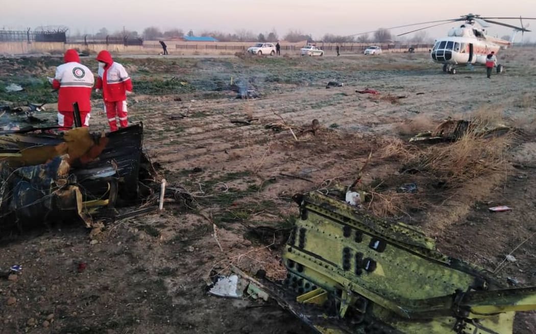 Red Crescent staff at the scene of the plane crash.